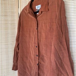 Terracotta button down, patterned shirt. SIZE M